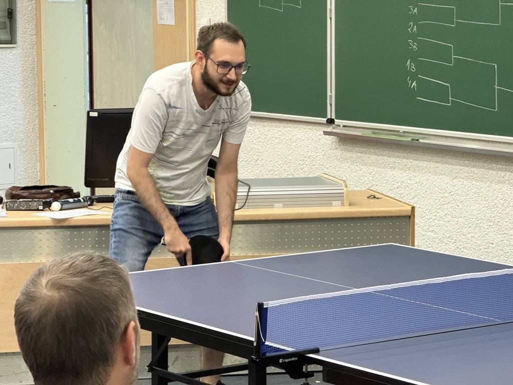 Bartosz playing table tennis.